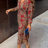 Midi dress with wrap effect and leaf print