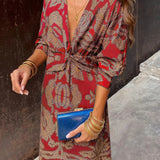 Midi dress with wrap effect and leaf print