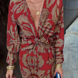 Midi dress with wrap effect and leaf print
